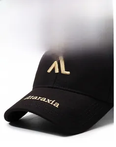 Close-up of premium black baseball cap featuring gold AL embroidery and fine stitching