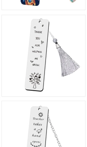 Detailed close-up of engraved stainless steel bookmarks with grey tassels for teachers