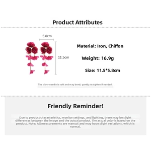 Detail view of rose red chiffon flower tassel earrings with multilayered petal design
