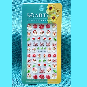 Detailed 5D embossed Christmas nail stickers featuring Santa and reindeer on display card