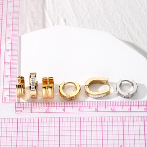 Fashionable stainless steel earrings set in gold and silver with zircon accents