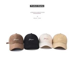 Detailed display showing four color variations of cotton baseball caps with me embroidery