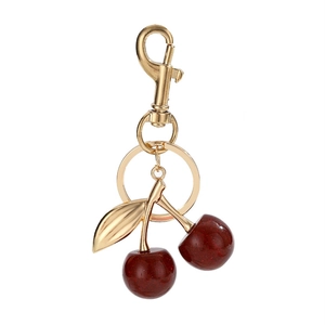 Vintage style glossy red cherry keychain with gold metal leaves and lobster clasp