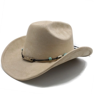 Macro detail of faux suede cowboy hat with turquoise beads and shell ornament band