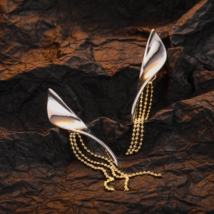 Elegant two-tone willow leaf tassel earrings with silver arc metal and golden bead chains