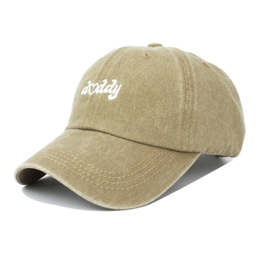 Vintage washed cotton baseball cap in khaki with daddy embroidery on a white background