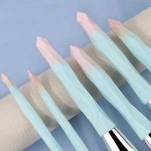 15-piece diamond makeup brush set with gradient blue geometric crystal textured handles