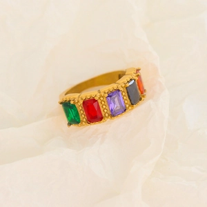 Detailed close-up of a gold-plated vintage ring with five colorful rectangular zircons
