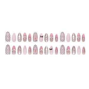Pink French cat eye press-on nails with bow, polka dots and vine lace design