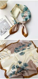 Detail of silk square scarf with ginkgo leaf print and brown border on beige base