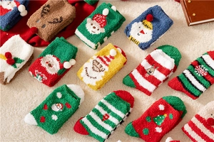 Flat lay of colorful Christmas fuzzy socks with festive patterns on a soft rug