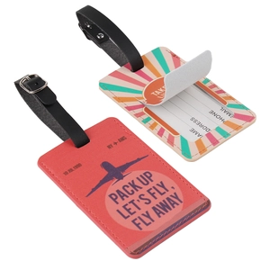 Close-up of PU leather luggage tags with travel slogans and personal info labels