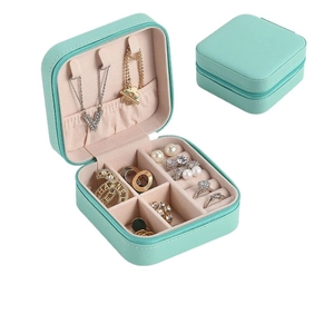 Portable mint green PU leather jewelry organizer with zipper closure and velvet interior