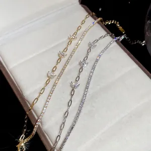 18k gold plated bracelet set with zircon flower and crown charms in velvet box