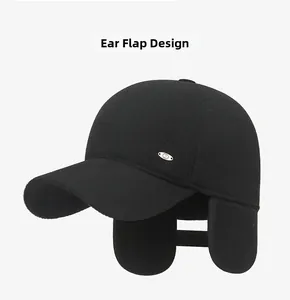 Detail view of winter baseball cap with unfolded ear flaps and silver accent