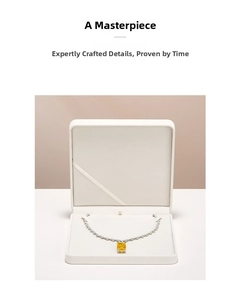 Detailed view of yellow cushion cut gemstone necklace with a white premium jewelry gift box