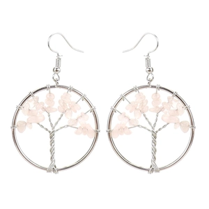 Detail of silver wire tree of life earrings featuring handmade pink crystal stones