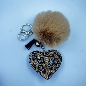 Leopard print heart keychain with brown pom pom, black tassel and sparkling rhinestones