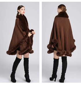 Front and back view of brown knit poncho with faux fur collar and pom-pom detailing