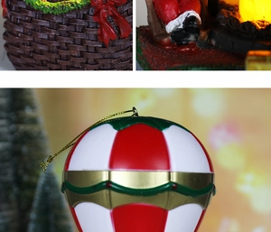 Detailaufnahmen festlicher Weihnachtsornamente aus Harz mit warmem LED-Kaminlicht-Effekt.