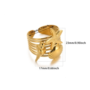 Detailed view of golden multi-layer ring with starfish and parrot charms including size specs