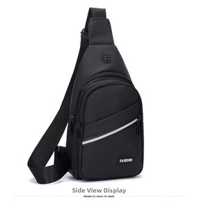 Detail of black sling bag featuring a headphone jack and a reflective safety strip