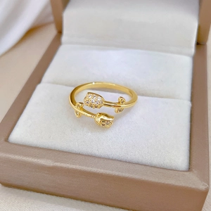 Elegant gold tulip open ring with sparkling white cubic zirconia in a velvet box