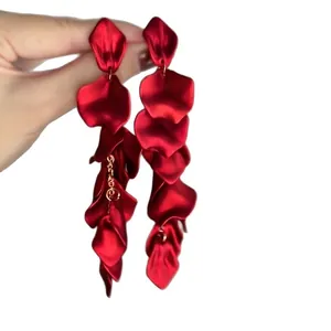Long layered red rose petal drop earrings in a minimalist elegant floral design