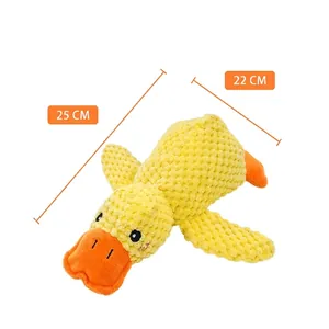 Dettaglio del giocattolo di peluche anatra gialla per cani con trama a nido d'ape e 25cm