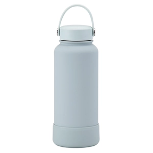 Detail of light blue 1L vacuum flask with matte finish, carry handle and silicone base boot