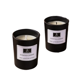 Set of two black ceramic scented candles with white labels for car and home freshening