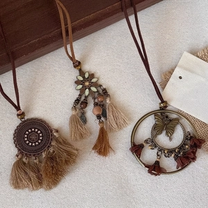 Bohemian feather star oval necklace set with vintage tribal pendants on faux leather cord
