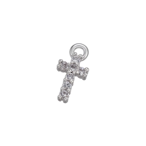 Detailed close-up of a silver cross pendant inlaid with brilliant round-cut cubic zirconia