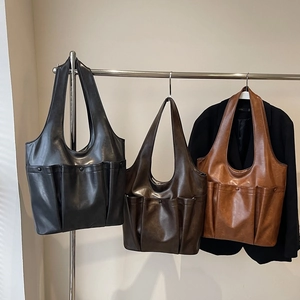 Retro PU leather tote bag with large capacity, shown in black, brown, and caramel colors