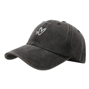 Distressed black baseball cap with white heart embroidery and retro washed cotton finish