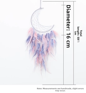 Detail view of pink dream catcher with dimensions showing 16cm width and 59cm length