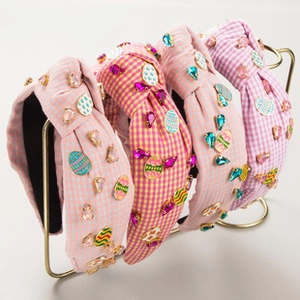 Detailed view of four Easter headbands with plaid fabric, rhinestones, and egg accents
