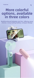 Detail view of foldable mini fan used as a mobile phone stand and emergency flashlight