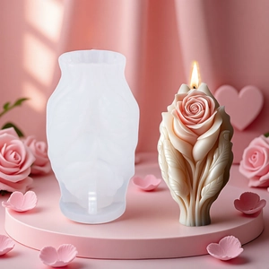 3D rose heart silicone mold with a finished burning candle for DIY craft projects