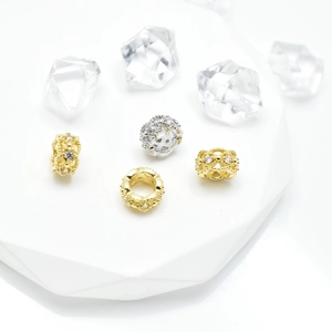 Micro-pave hollow spacer beads in gold and silver finish for DIY jewelry making