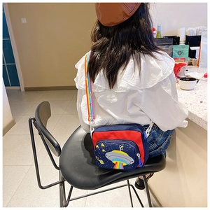 Kid's colorful unicorn crossbody bag with rainbow strap and UFO pattern detail
