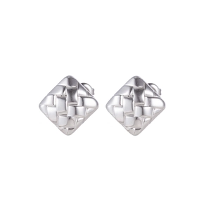 Macro detail of silver square stud earrings with unique woven metal texture design