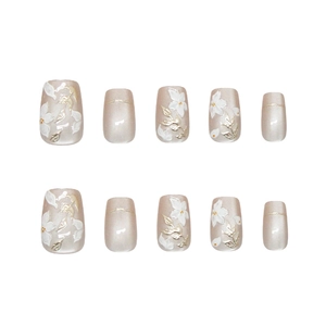 Handmade cat eye press-on nails with white 3D flowers and golden leaves on pearl base