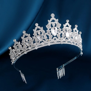 Detail of silver alloy bridal crown featuring large black crystals and shimmering diamonds