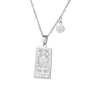 Detailed macro of silver stainless steel Leo zodiac tarot pendant and star sign charm