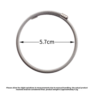 Detail of silver twisted cable cuff bracelet showing 5.7cm diameter and 9.2g weight