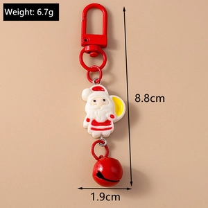 Detail view of red Santa Claus keychain with size 8.8cm and weight 6.7g specifications