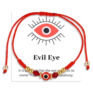 Adjustable pink woven evil eye bracelet with protective charm card for women