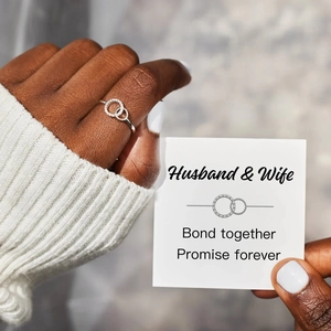 Interlocked S925 silver rings with zircon on hand and Husband & Wife gift card