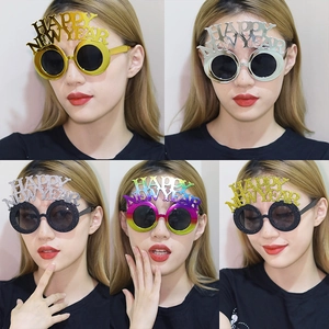 Multi-color Happy New Year party glasses featuring glitter frames and dark lenses